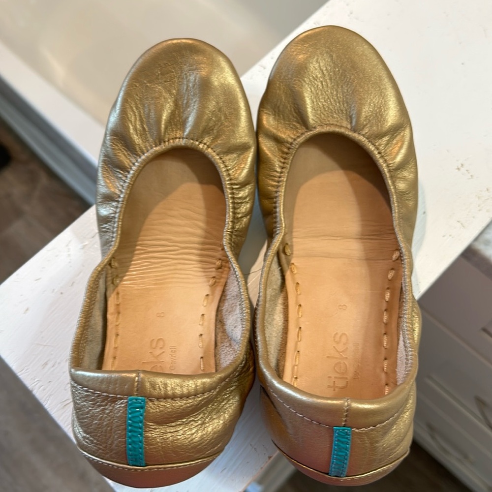 Solid gold tieks size 8